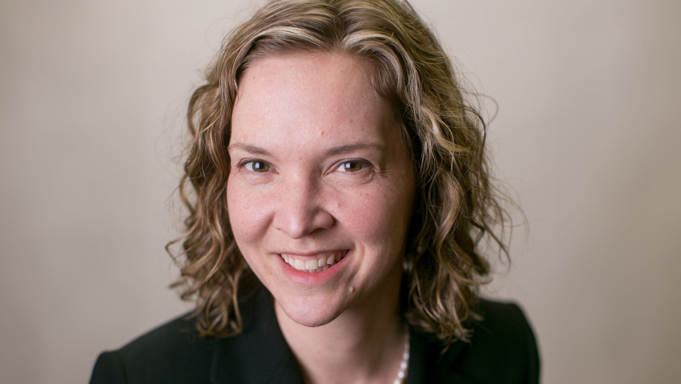 a person smiling for a picture